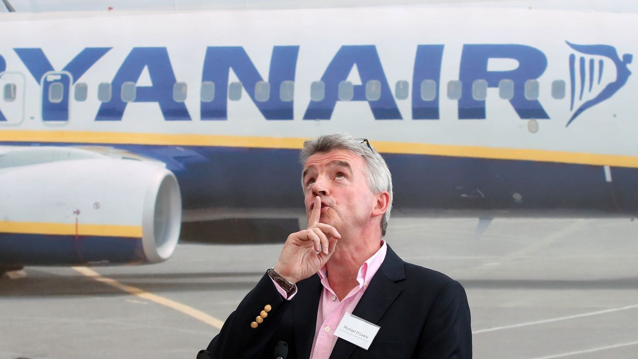 Ryanair chief executive Michael O'Leary shh finger to his lips