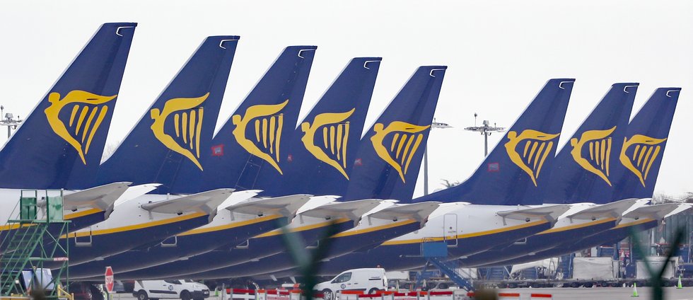 Ryanair jets parked up on the runway of Dublin airport.