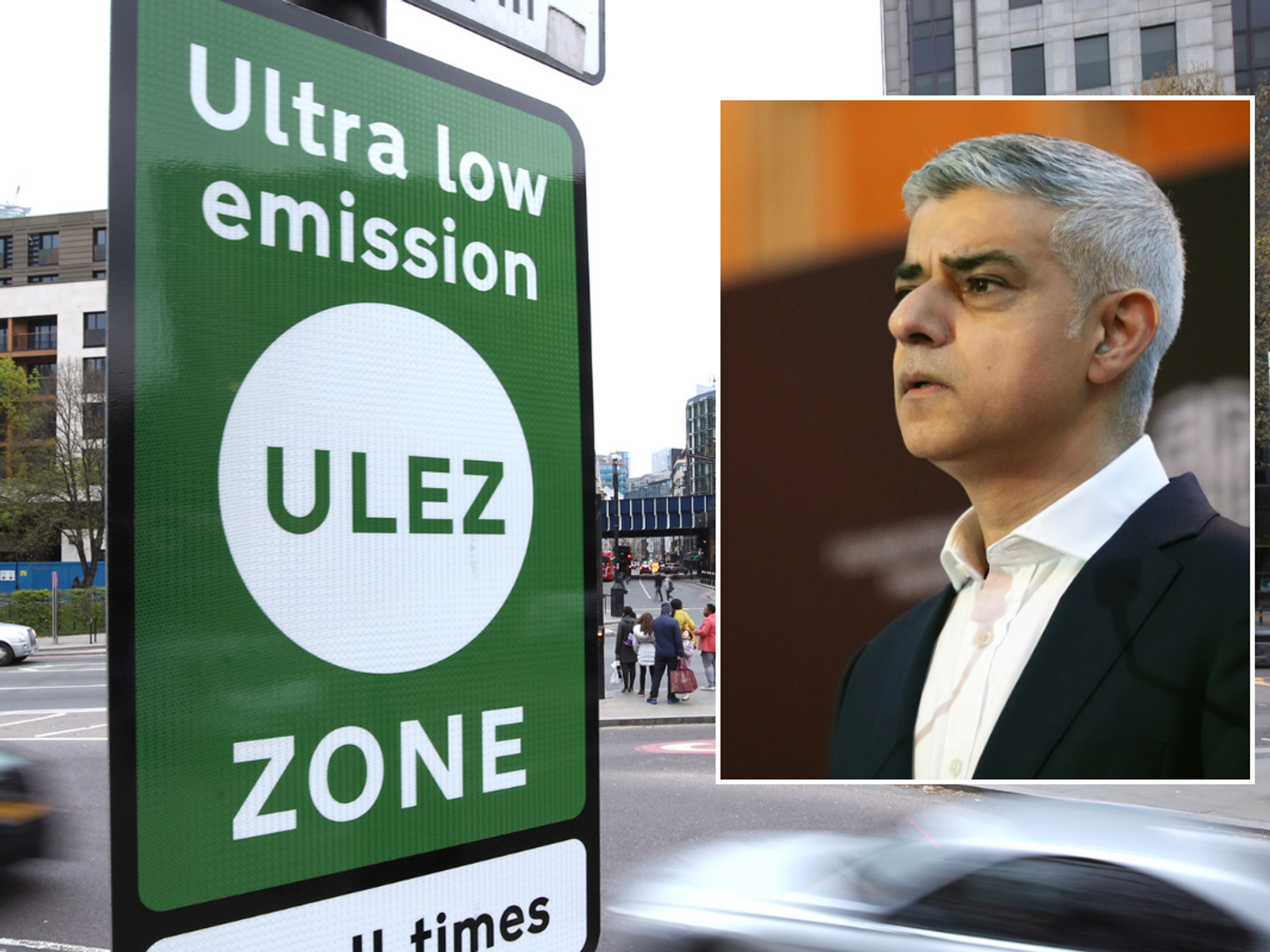 Sadiq Khan and a Ulez sign