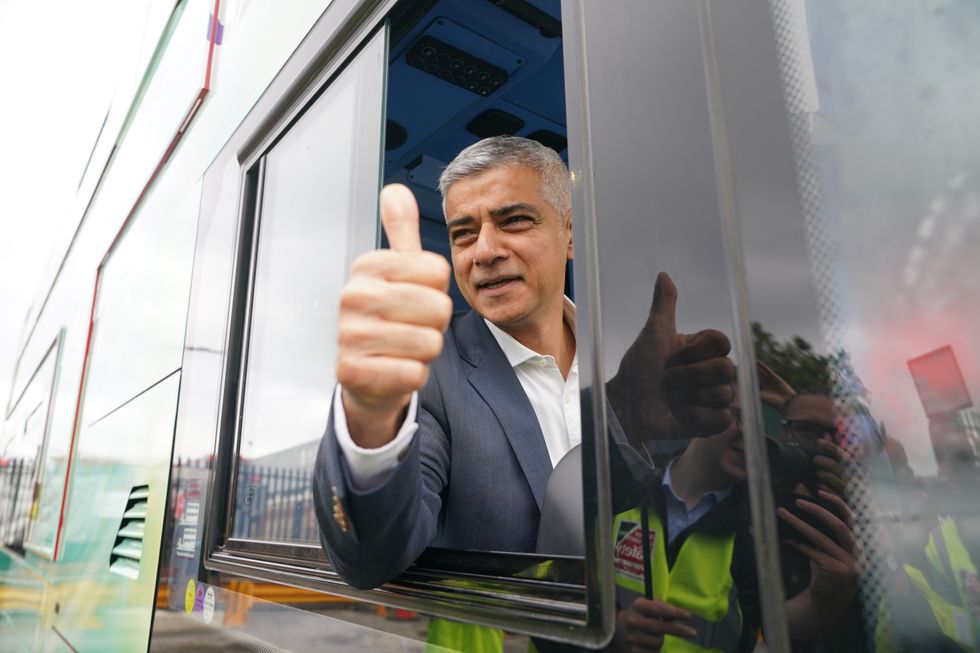 Sadiq Khan driving a London bus