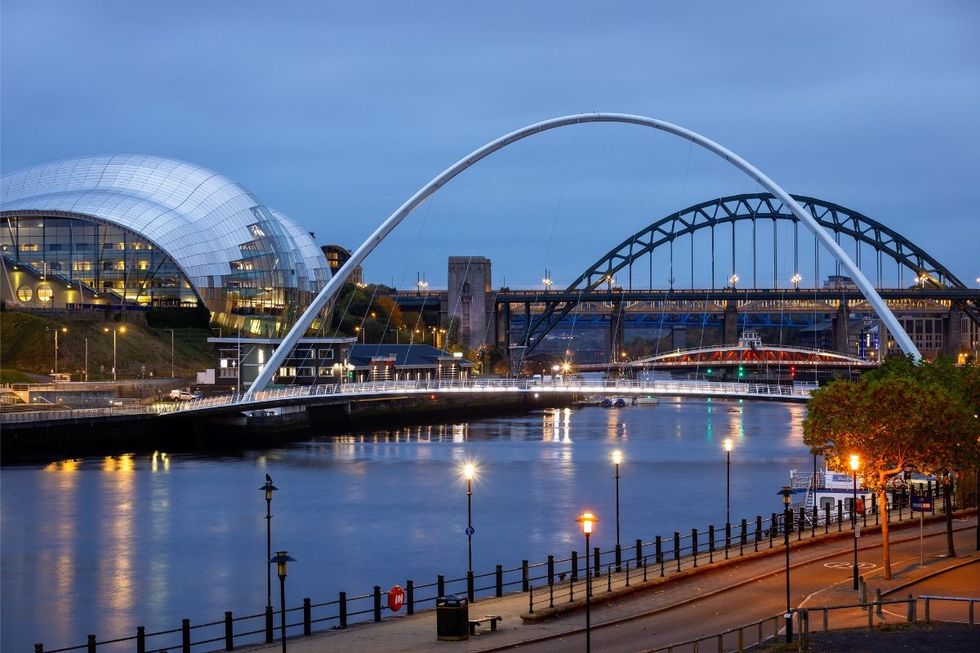 Sage Gateshead (chrome building left), Gateshead Millennium Bridge (near), Tyne Bridge, Newcastle