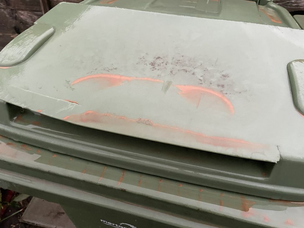 Saharan dust on a bin, as the dust cloud which is moving across Europe hit the UK, turning the skies orange and red over southern parts of the country, forecasters have said. Picture date: Wednesday March 16, 2022.