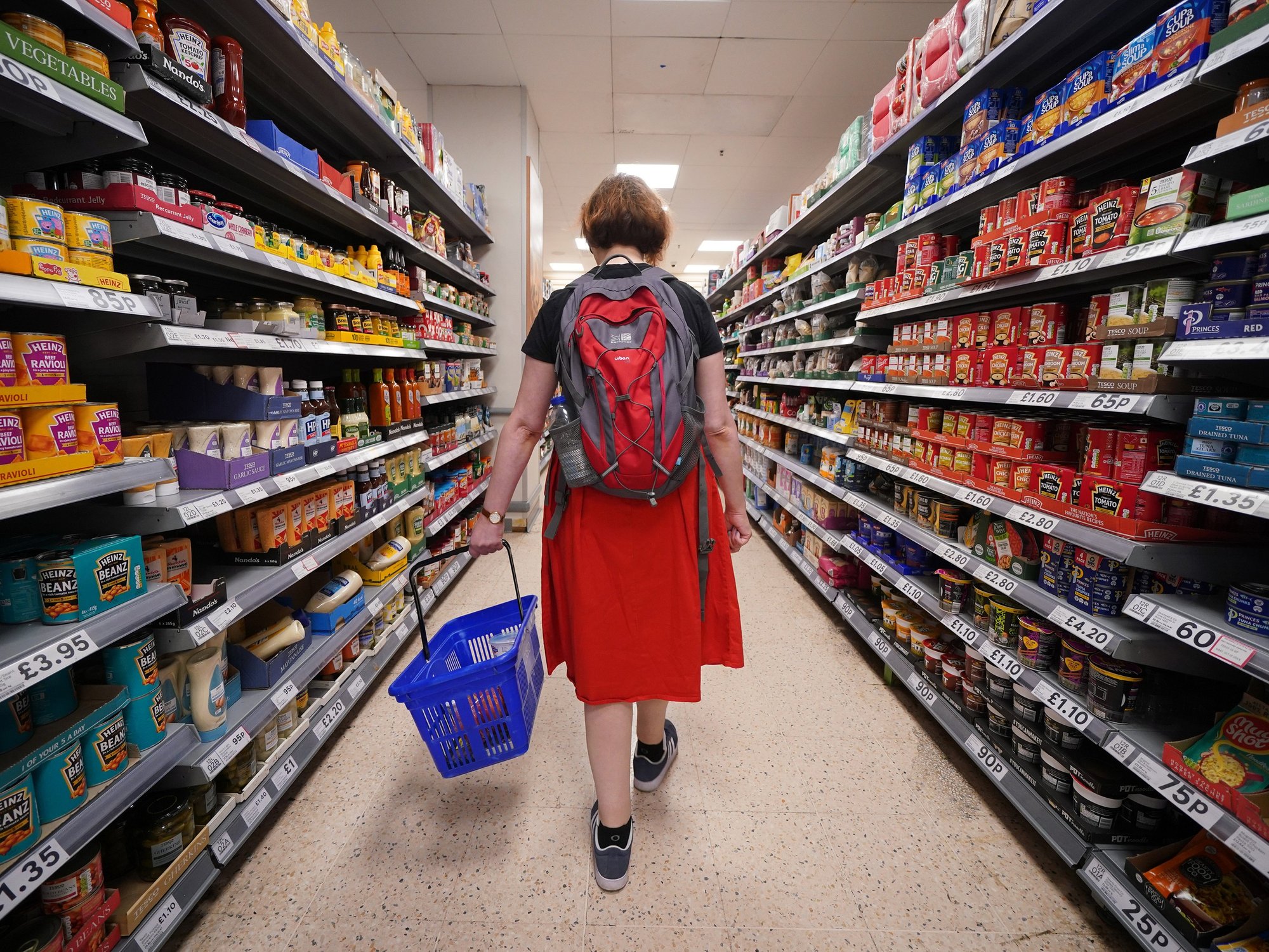 Sainsbury's shopper in supermarket