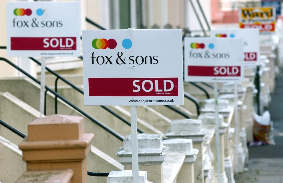 sale signs outside homes