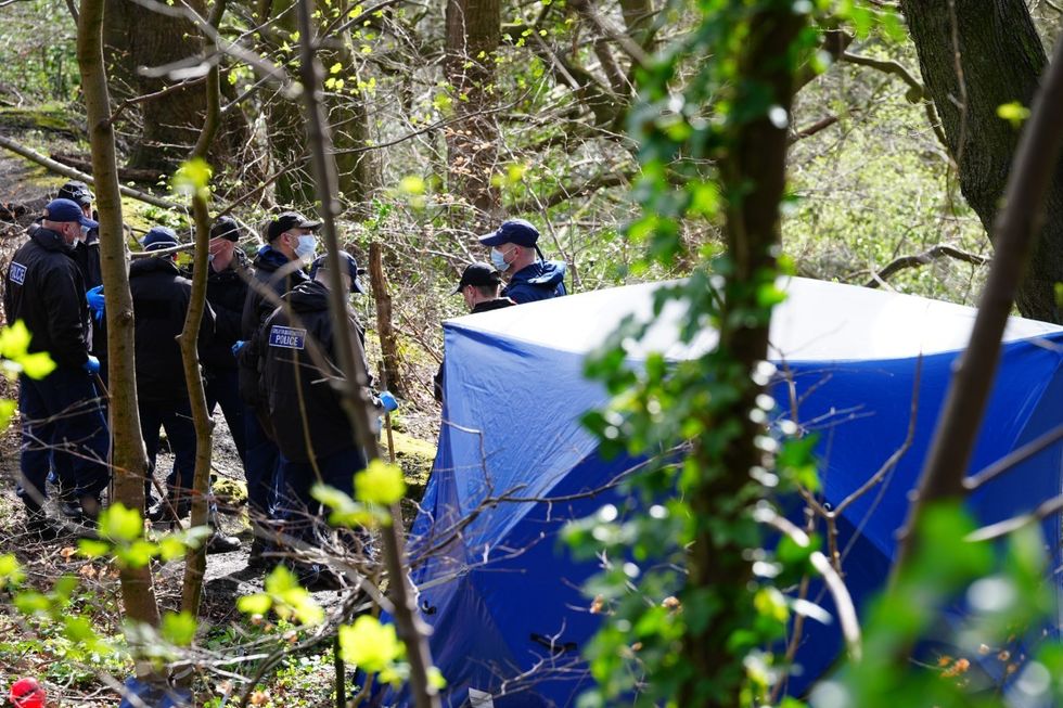 Salford: Police erect tent after human remains found