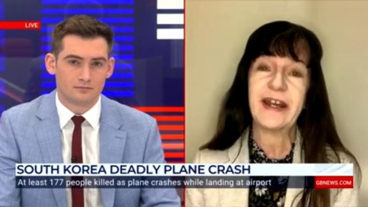 At least one dead after plane crashes into jet on runway as all flights grounded at major US airport
