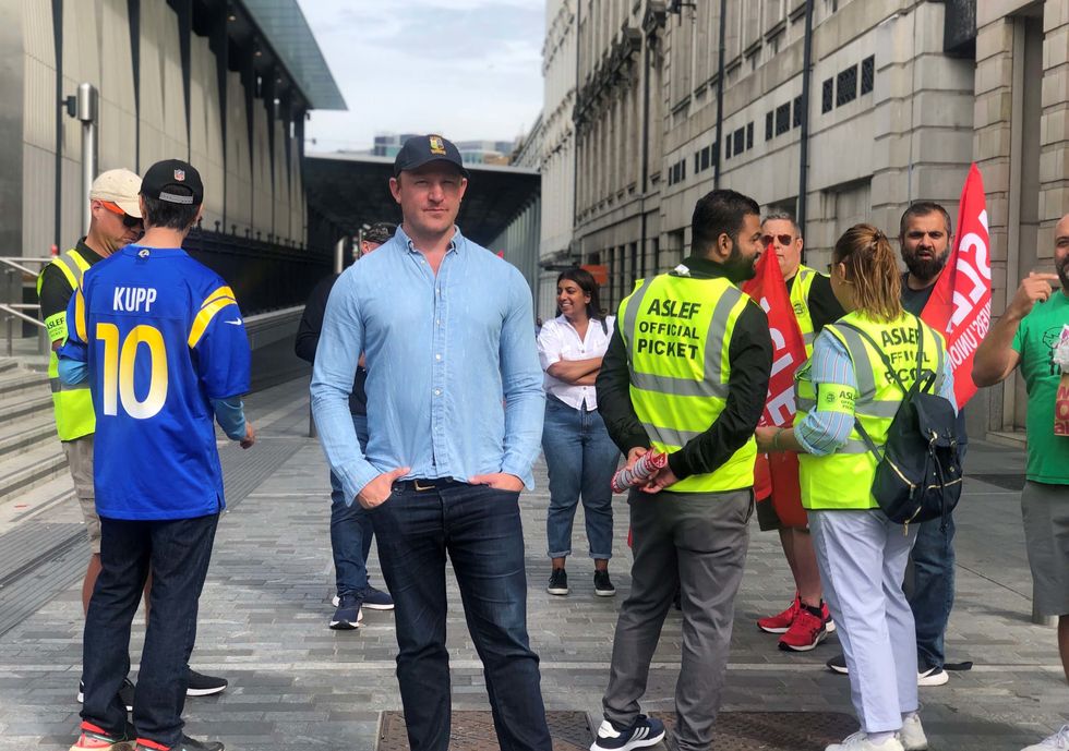 Sam Tarry (centre) joined rail workers on the picket lines last year