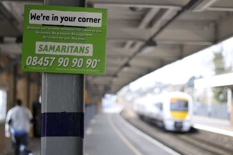 Samaritans signpost on train station
