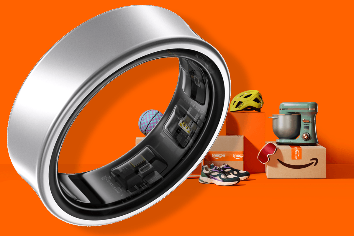 Samsung Galaxy Ring in front of Amazon boxes and orange background