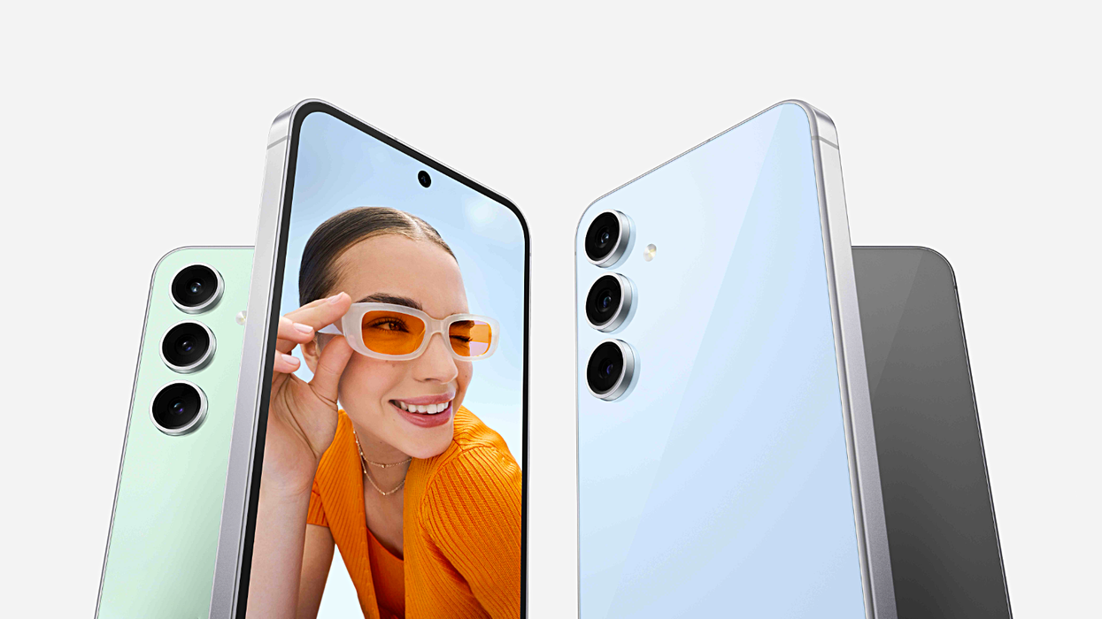 samsung galaxy s24 fe pictured in blue and mint with its triple-camera system on show