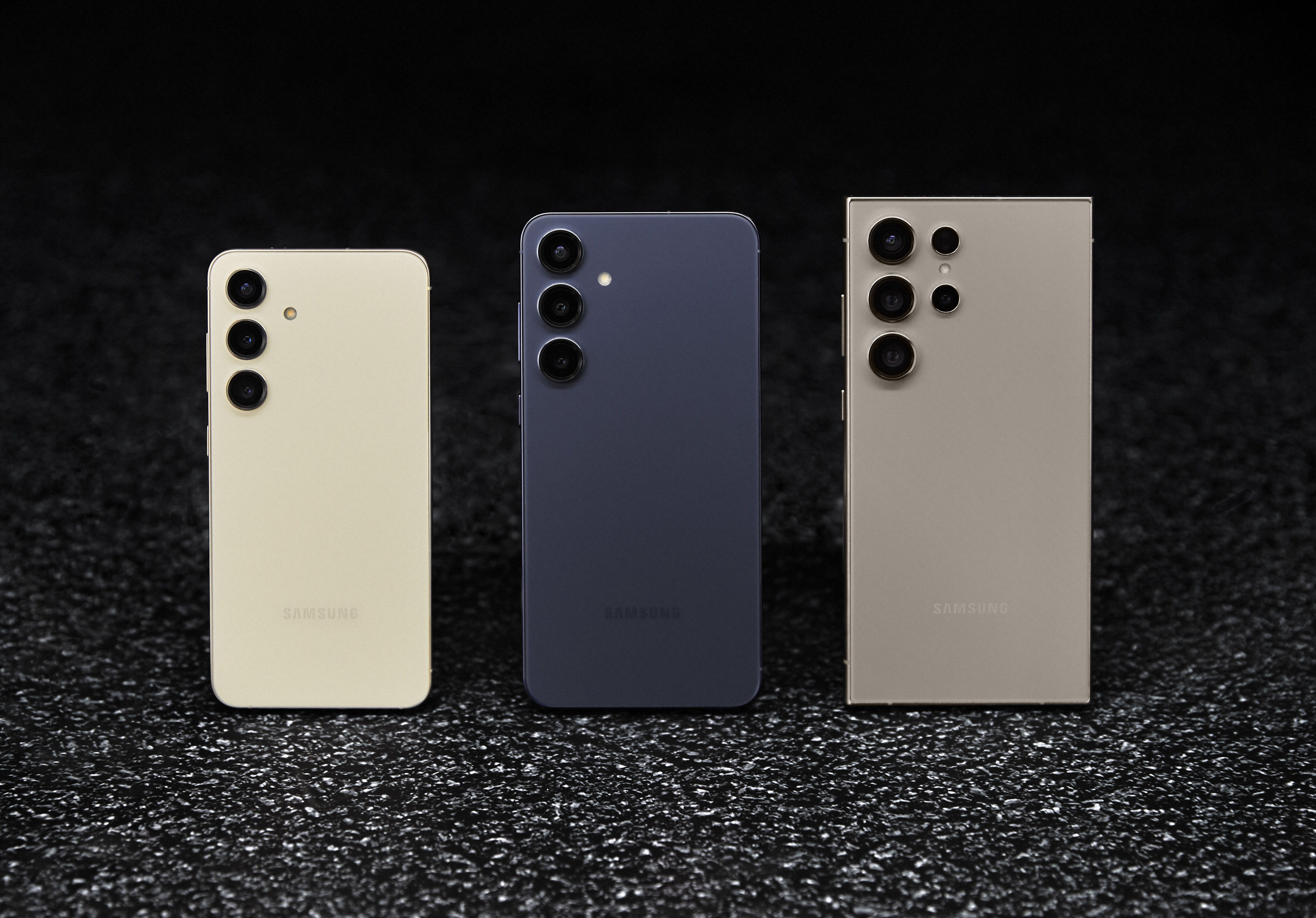 samsung galaxy s24, galaxy s24 plus, and galaxy s24 ultra pictured side by side on a dark background