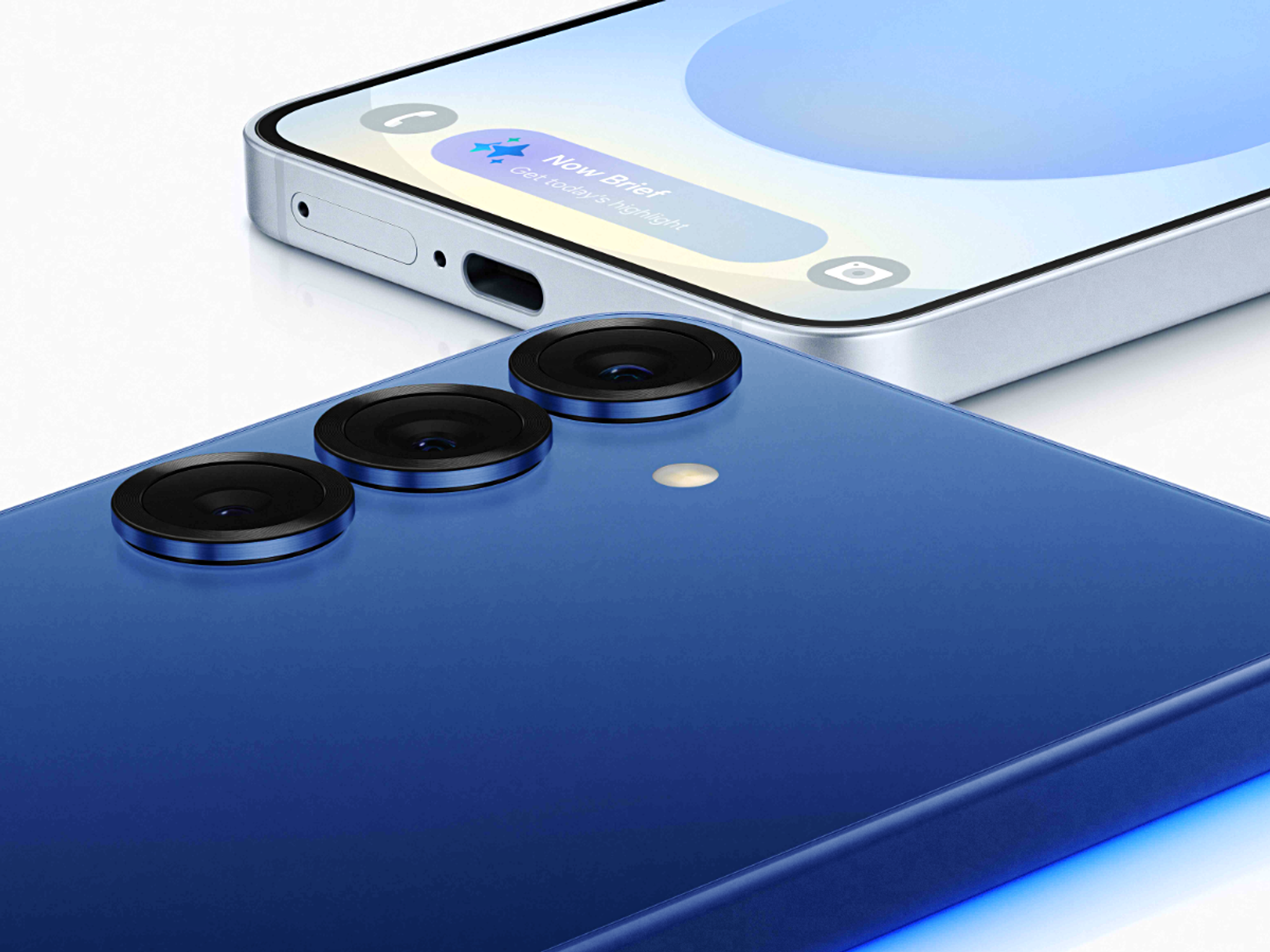 samsung galaxy s25 and galaxy s25 plus in blue lying on its side