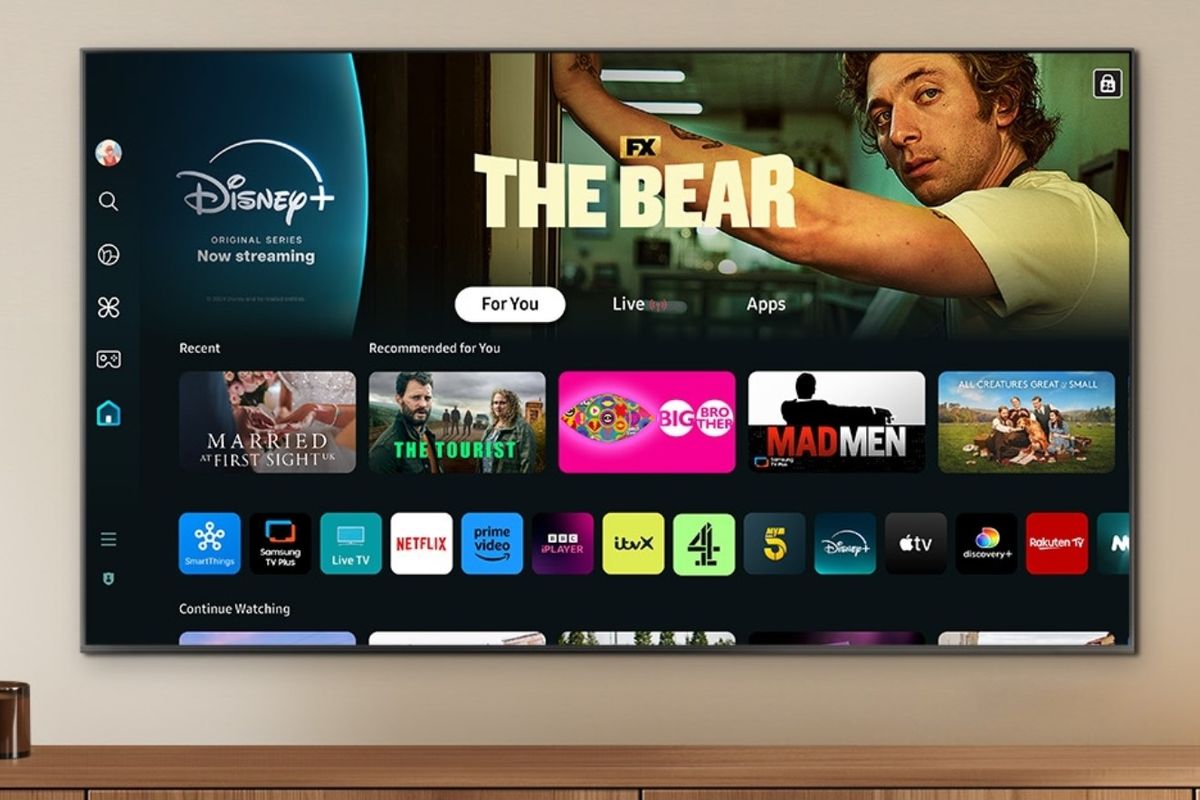 samsung neo QLED smart tv mounted on the wall with disney plus displayed on screen 