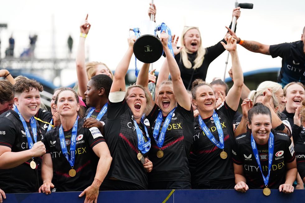 Saracens' Marlie Packer (centre left) lifts the Allianz Premier 15s trophy after the Allianz Premier15s play off final match at Sixways Stadium, Worcester. Picture date: Friday June 3, 2022.