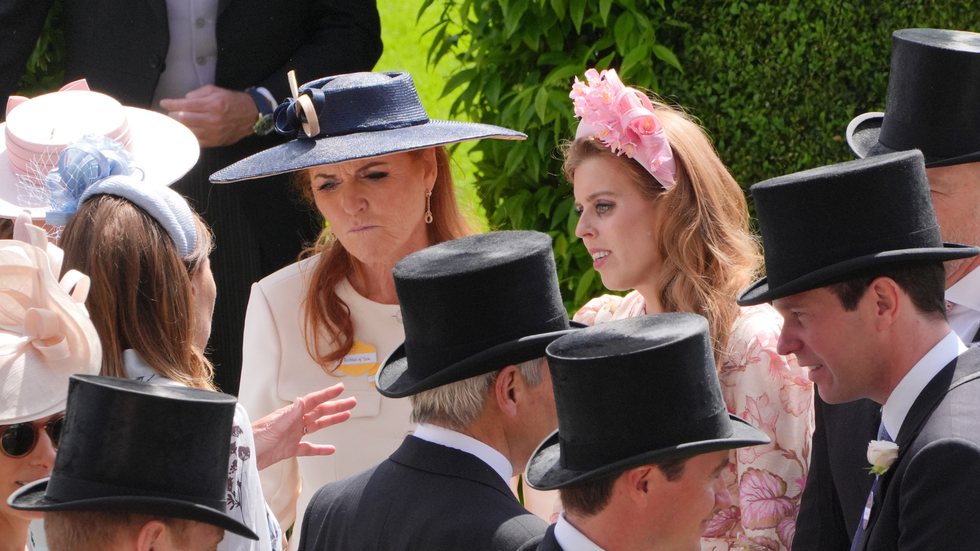 Sarah Ferguson and Princess Beatrice speak to Princess Eugenie