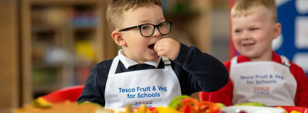 School child wearing Tesco Fruit & Veg for