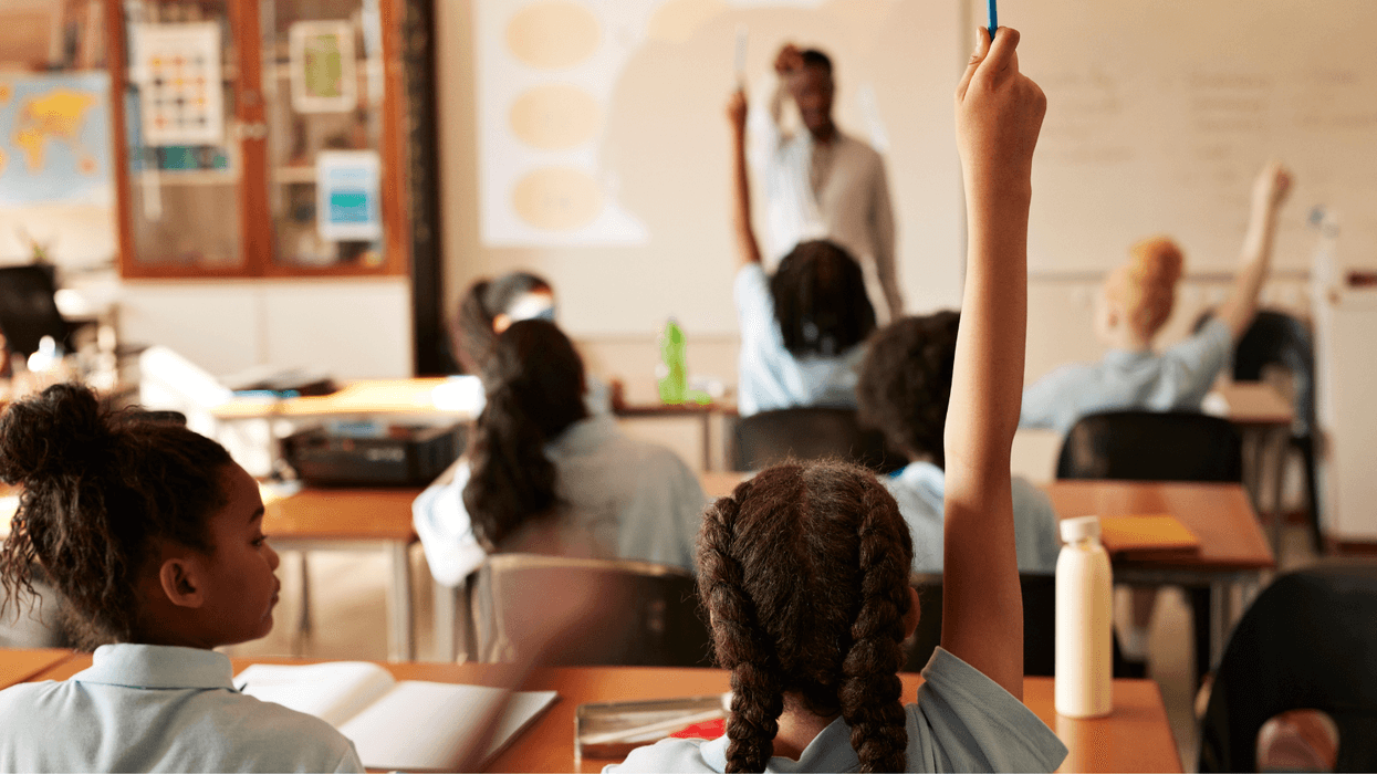 Schoolchildren in classroom (Stock)