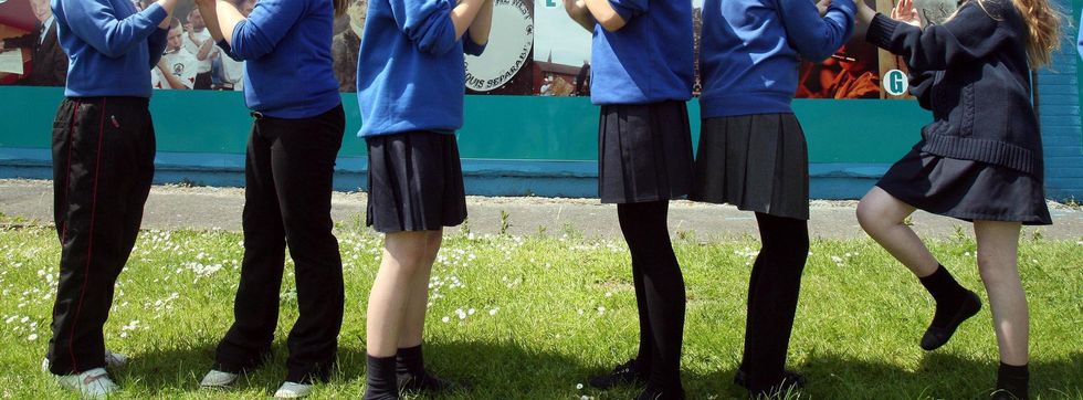 Schoolgirls wearing skirts. Boys at a Scottish school are being asked to do the same for the day.