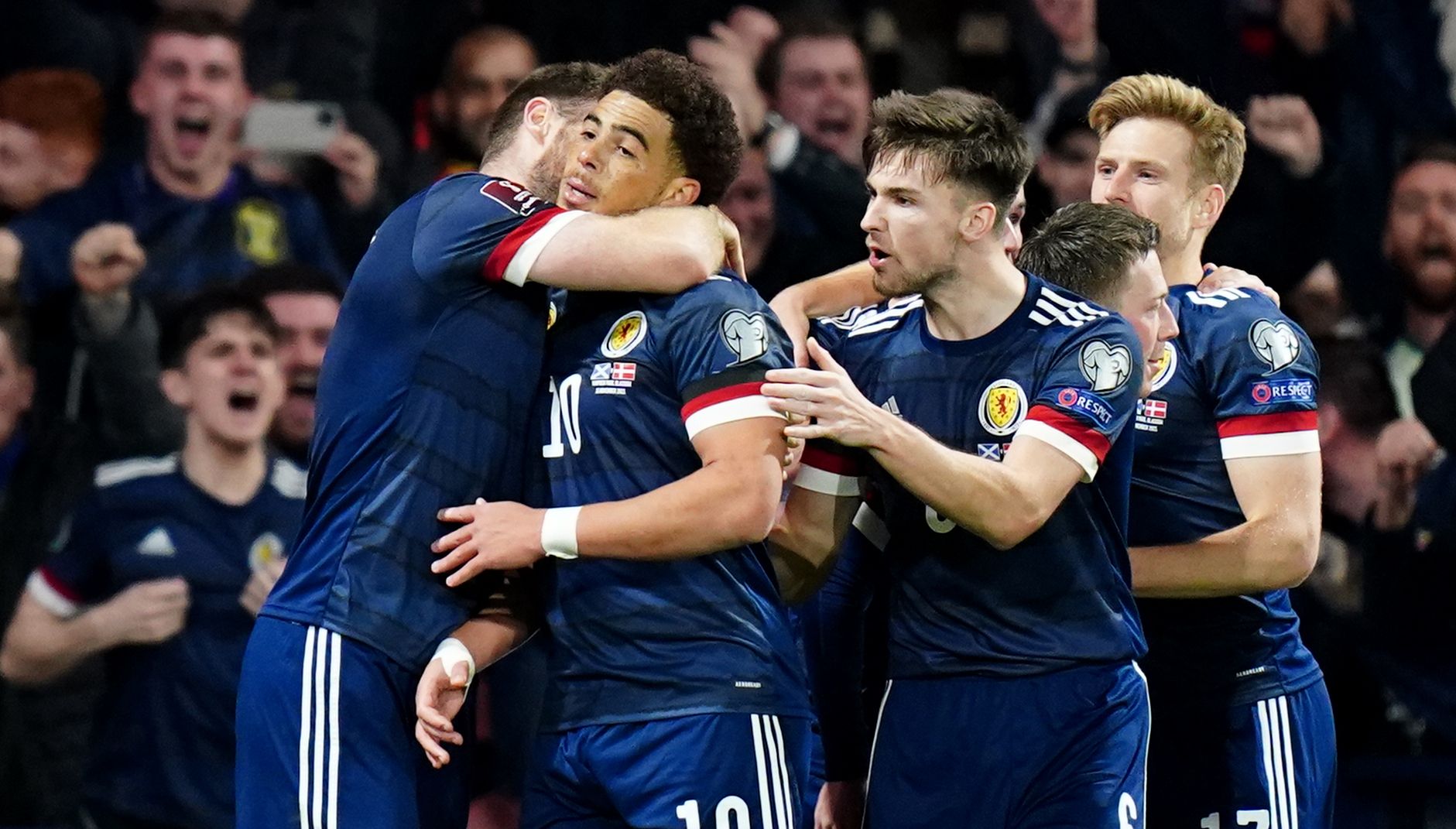 Scotland's Che Adams celebrates scoring their side's second goal of the game during the FIFA World Cup Qualifying match at Hampden Park, Glasgow.