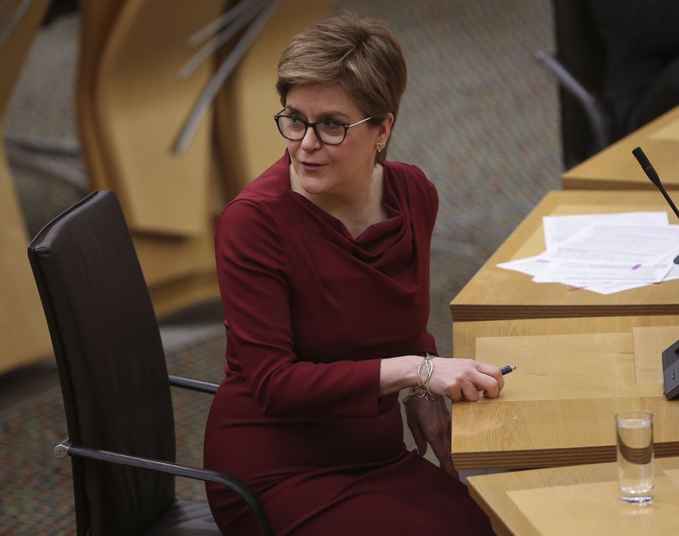 Scotland's First Minister Nicola Sturgeon, during First Minster's Questions at the Scottish Parliament in Holyrood, Edinburgh. Picture date: Thursday December 23, 2021.