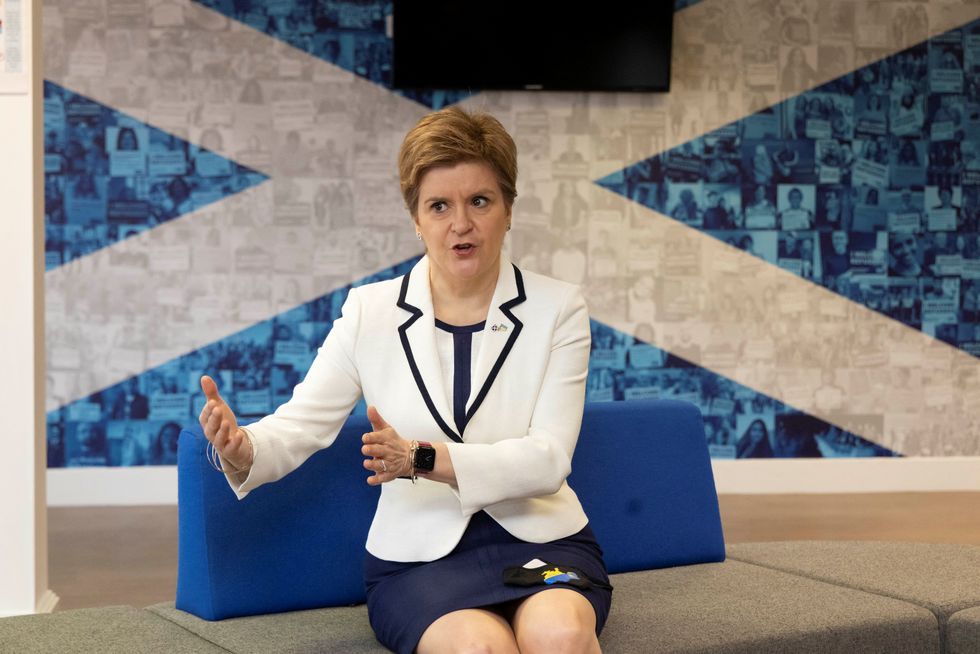 Scotland's First Minister Nicola Sturgeon meets with Ukrainian nationals, staff members and volunteers working with the Scottish Refugee Council, as work is underway to prepare for the arrival of people displaced from Ukraine, amid Russia's invasion, in Glasgow, Scotland, Britain March 16, 2022. Robert Perry/Pool via REUTERS