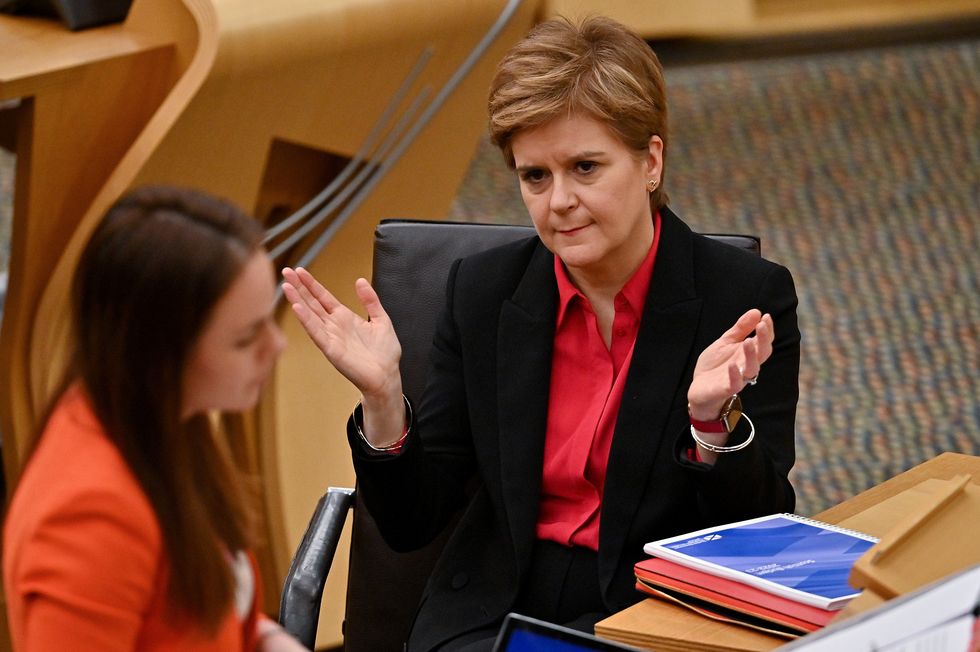 Scotland's First Minister Nicola Sturgeon (right) and Finance Secretary Kate Forbes as she delivers the Scottish Budget to the Scottish Parliament, Edinburgh.