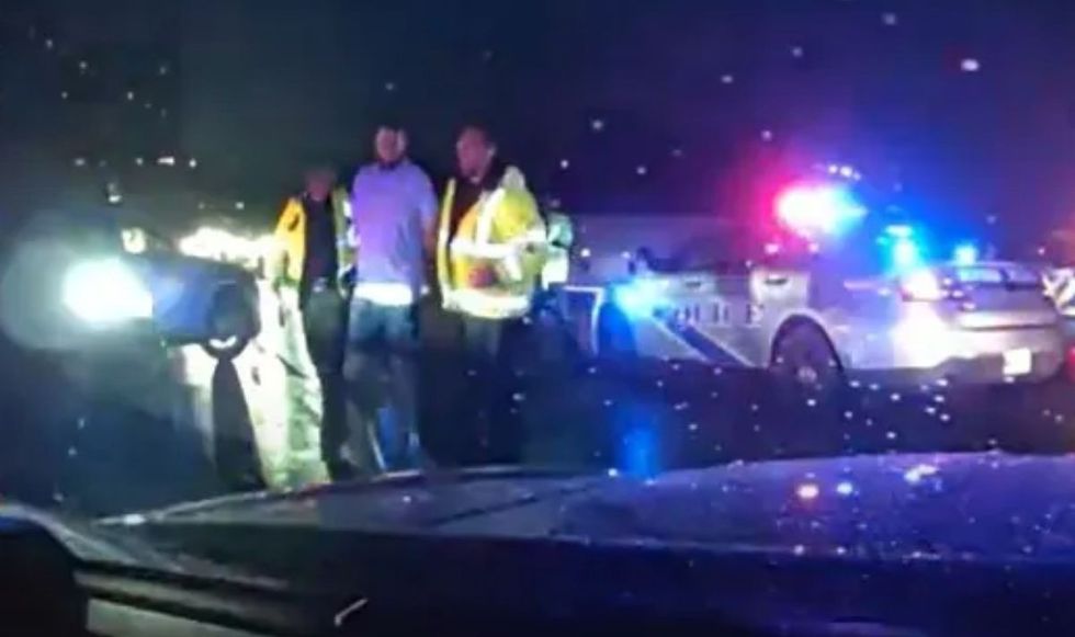 Scottie Scheffler was seen being taken away in handcuffs
