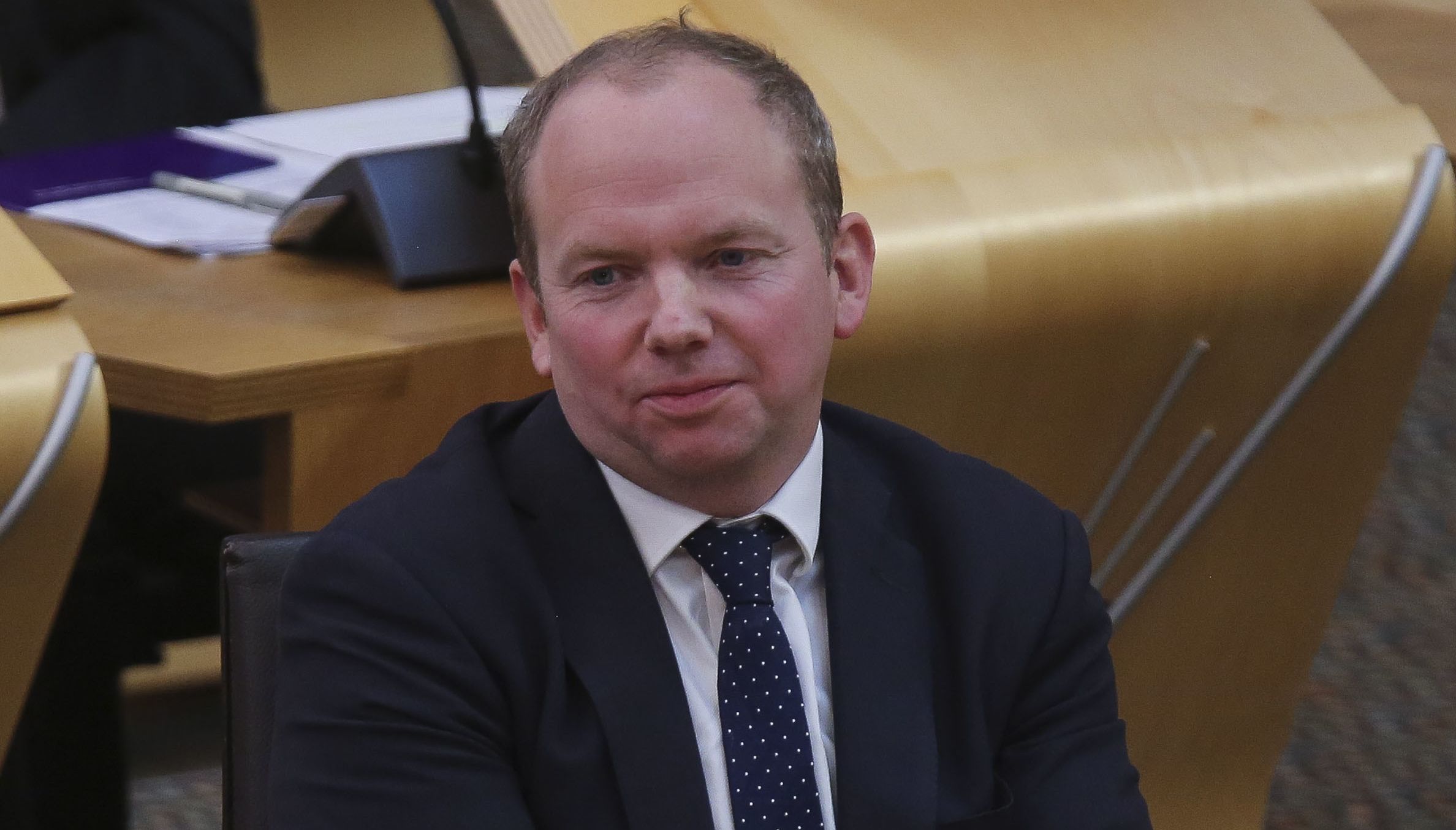 Scottish Conservative MSP Donald Cameron listens to Deputy First Minister John Swinney making a statement at the Scottish Parliament in Edinburgh, where he said work on a Bill to incorporate a UN treaty on children's rights into Scots law will continue despite the original being sent back to Holyrood by the UK Supreme Court. Picture date: Wednesday October 6, 2021.