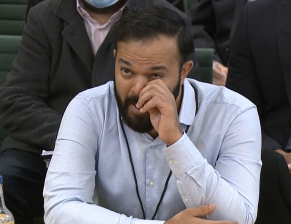 Screen grab from Parliament TV of former cricketer Azeem Rafiq crying as he gives evidence at the inquiry into racism he suffered at Yorkshire County Cricket Club, at the Digital, Culture, Media and Sport (DCMS) committee.