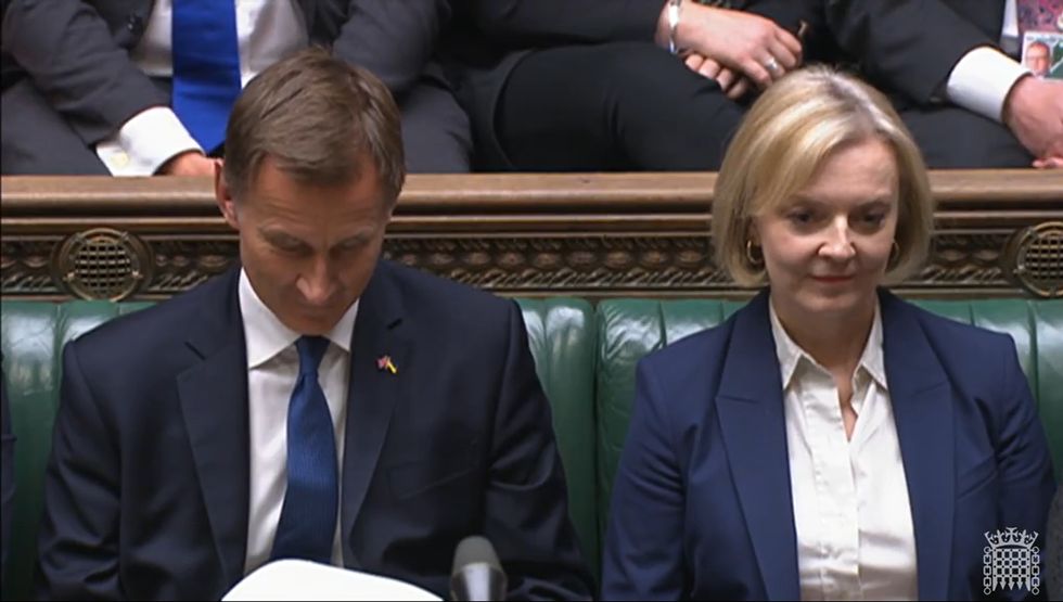 Screen grab of Chancellor of the Exchequer Jeremy Hunt (left) and Prime Minister Liz Truss listen to Shadow Chancellor Rachel Reeves' response the Chancellor's statement in the House of Commons, London. Picture date: Monday October 17, 2022.
