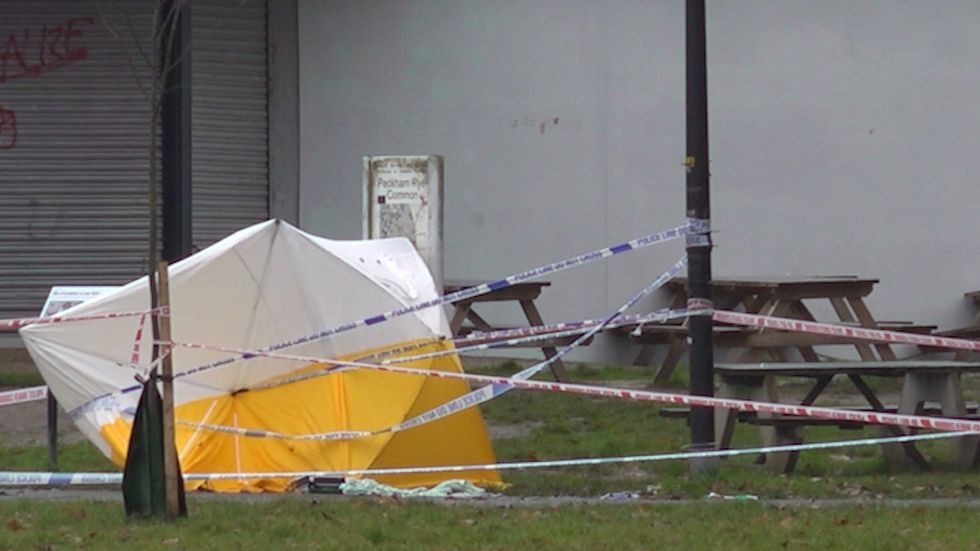 Screen grab taken from PA video of crime scene tape and a forensic tent at the scene at Peckham Rye Park, south London, where a 29-year-old man was stabbed to death on Friday. Officers found the 29-year-old in Straker's Road at about 8.30pm after reports of a stabbing. Picture date: Saturday December 31, 2022.