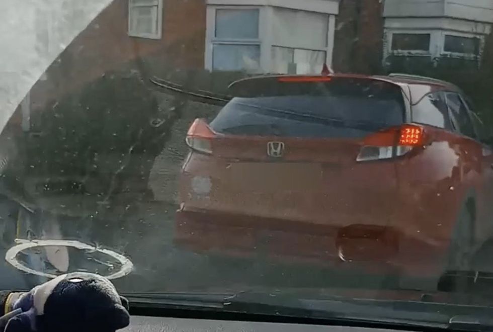 Screenshot from Lee Holmes' video showing the moment he confronted the driver