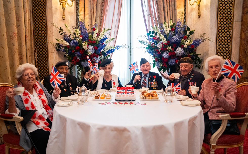 Second World War veterans Doreen Mills, 96, Gilbert Clarke, 98, Ruth Bourne, 98, Bernard Morgan, 100, Joe Mines, 100, and Joyce Wilding, 100, at a tea party organized by the Royal British Legion at The Ritz