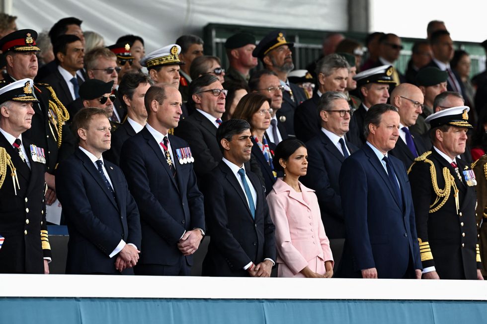 Secretary of State for Defence Grant Shapps, the Prince of Wales, Prime Minister Rishi Sunak and his wife Akshata Murty, Labour Party leader Sir Keir Starmer and Foreign Secretary Lord David Cameron at the UK's national commemorative event for the 80th anniversary of D-Day
