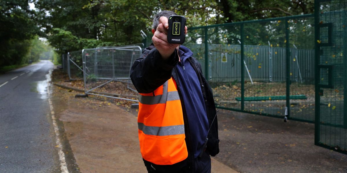 Man shells out £18k for round-the-clock security guard to protect tiny wall from being ripped down Man shells out £18k for round-the-clock security guard to protect tiny wall from being ripped down