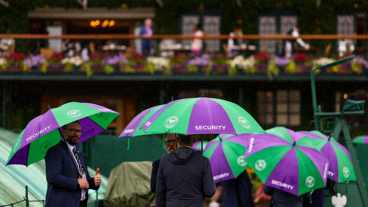 security in the rain at Wimbledon