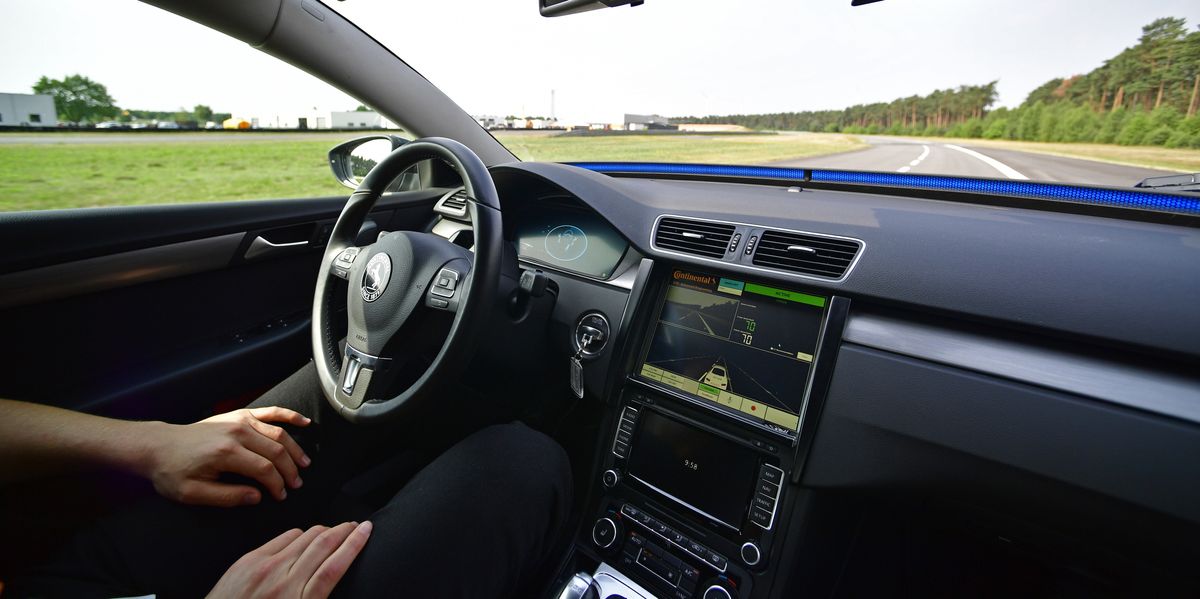 NextImg:Self-driving cars confirmed for UK roads next year with motorists able to hire driverless taxis