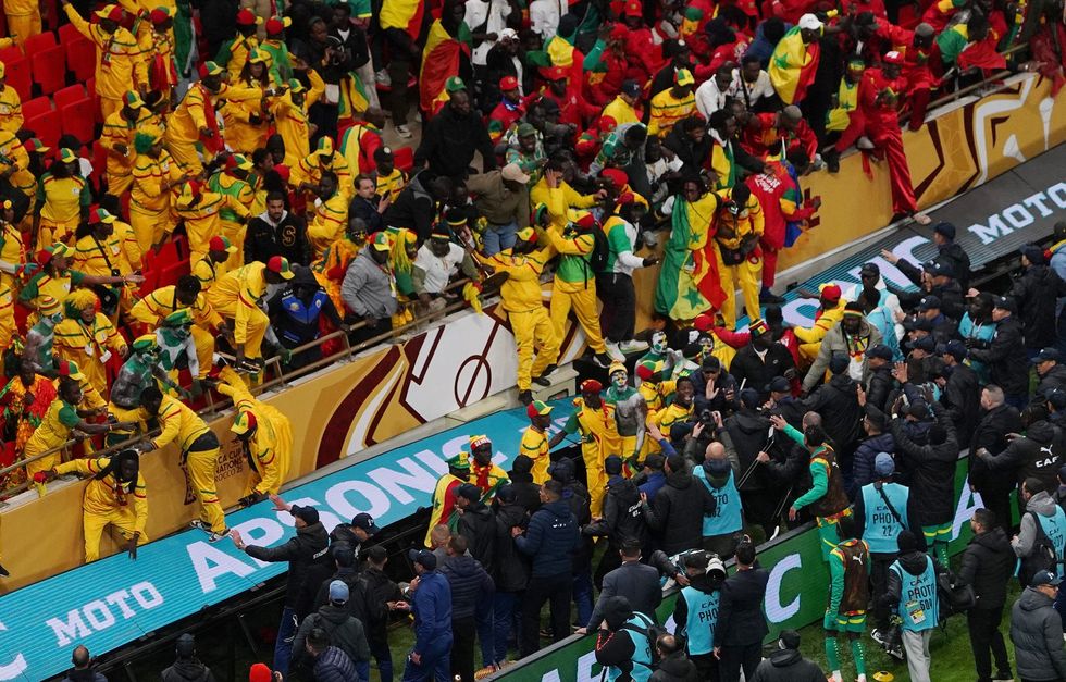 Senegal fans tried to break onto the pitch during the mayhem