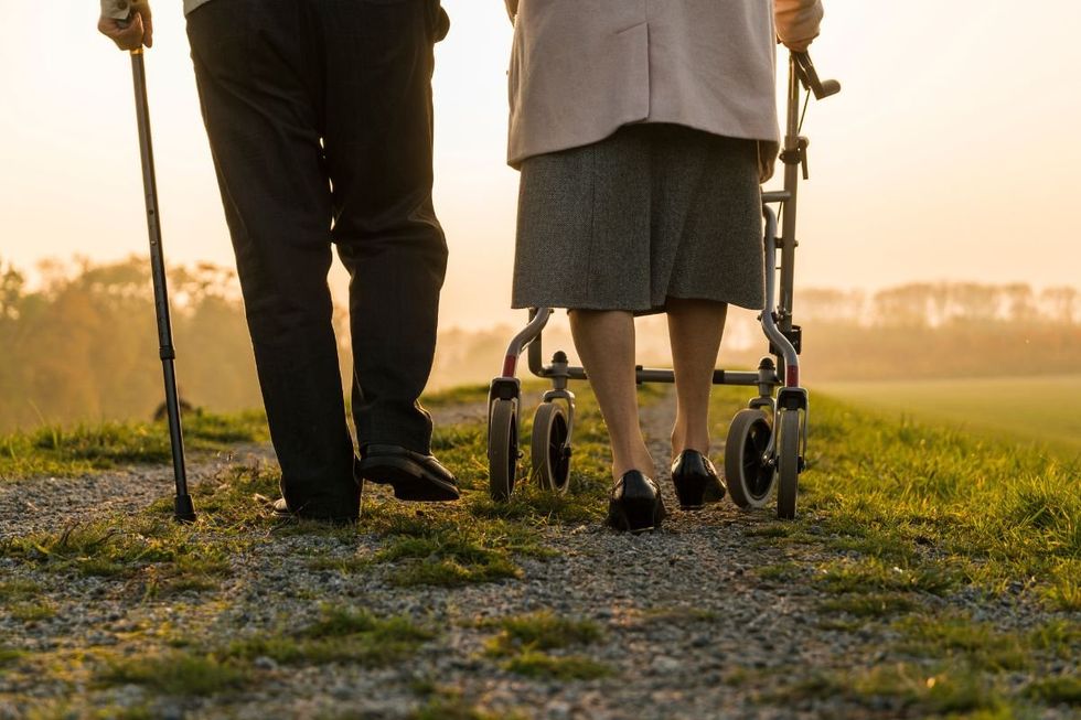 SENIOR COUPLE ON STROLL