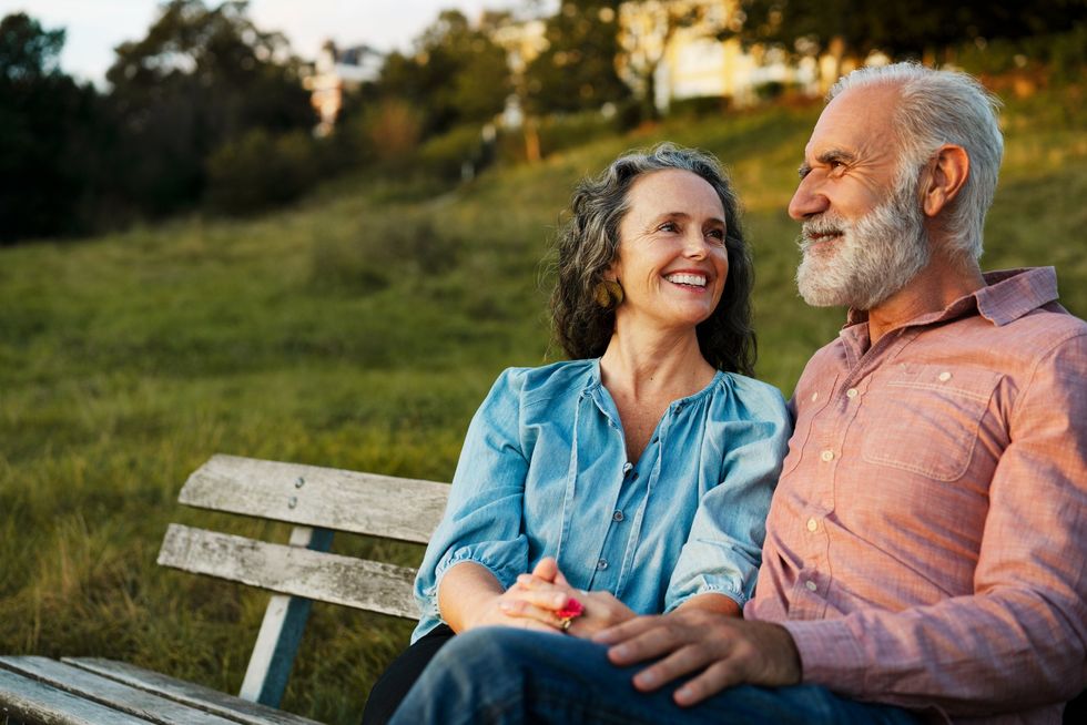 Senior couple sitting on bench