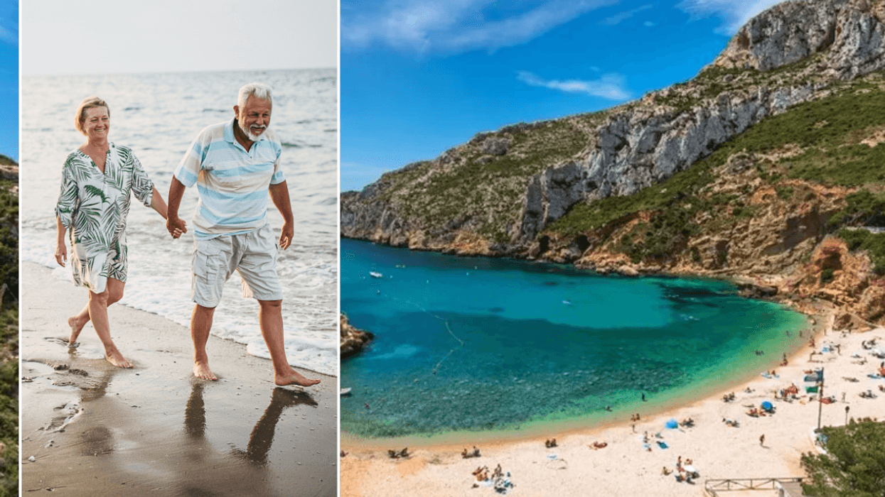 Senior couple walking on beach / Valencia beach