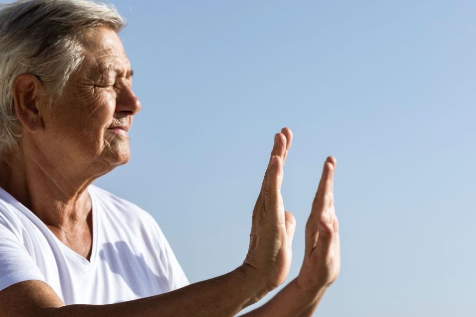Senior person doing tai chi
