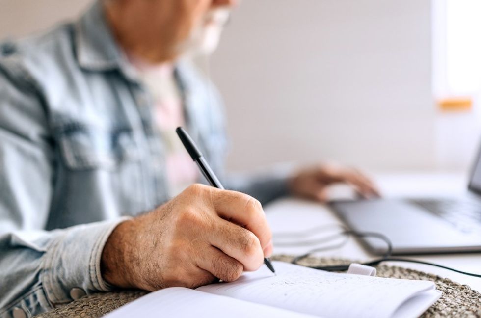 SENIOR PERSON WRITING