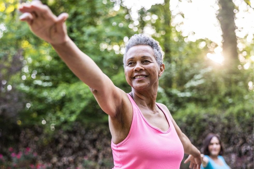 SENIOR WOMAN WORKING OUT