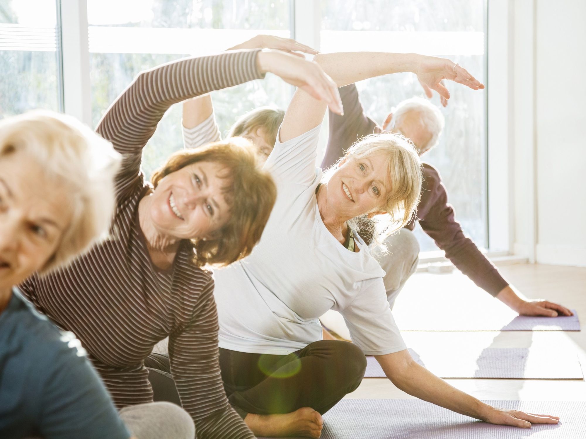 Seniors doing yoga
