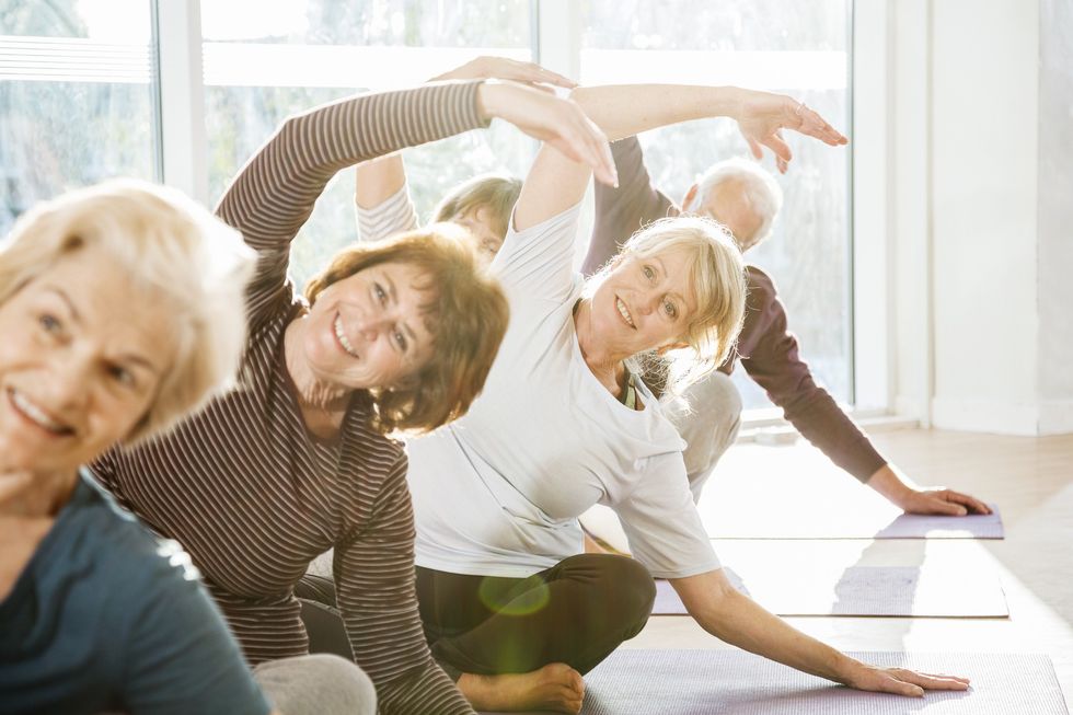 Seniors doing yoga