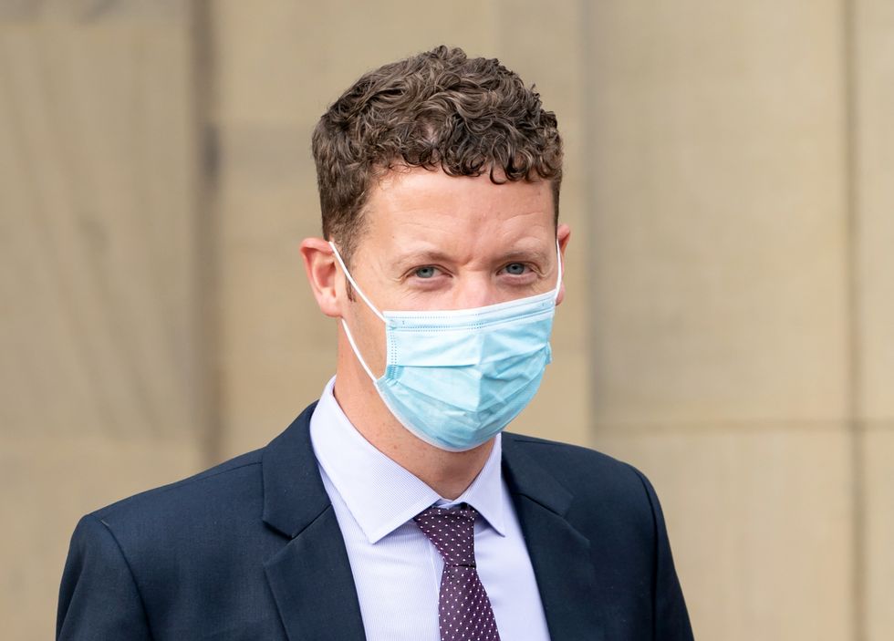 Sergeant Ben Lister leaves Bradford Crown Court, where he is on trial accused of raping and sexually assaulting a woman in Bradford on August 29 2016.