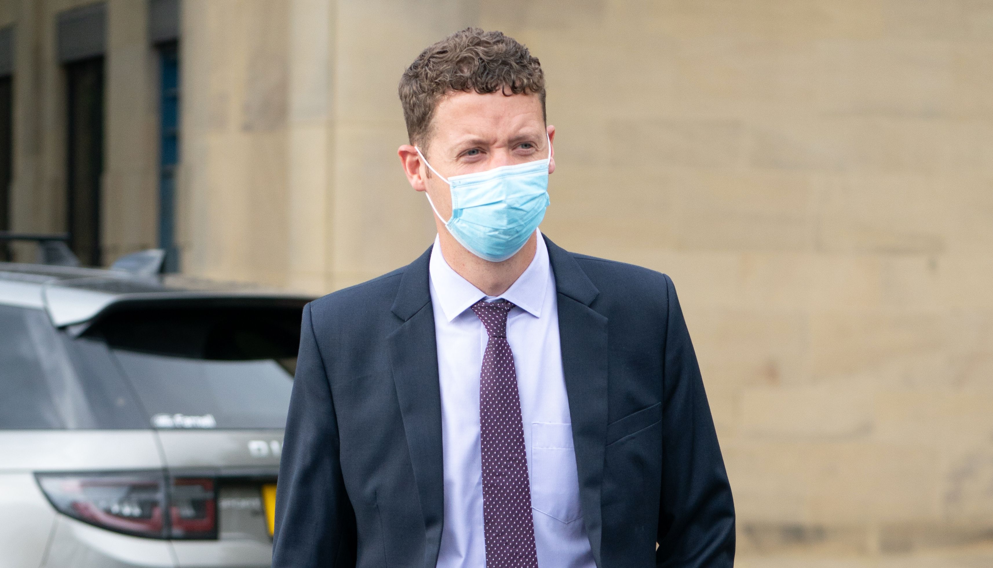 Sergeant Ben Lister leaves Bradford Crown Court, where he is on trial accused of raping and sexually assaulting a woman in Bradford on August 29 2016.