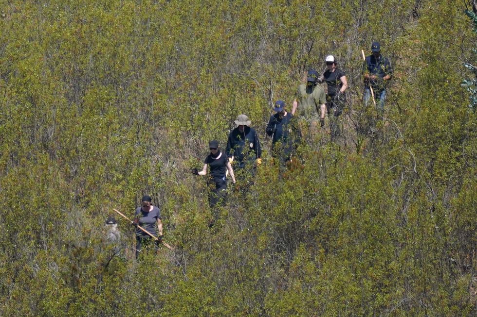 Several holes were dug into the ground to collect samples of soil, which have been sent for forensic and DNA testing in Germany