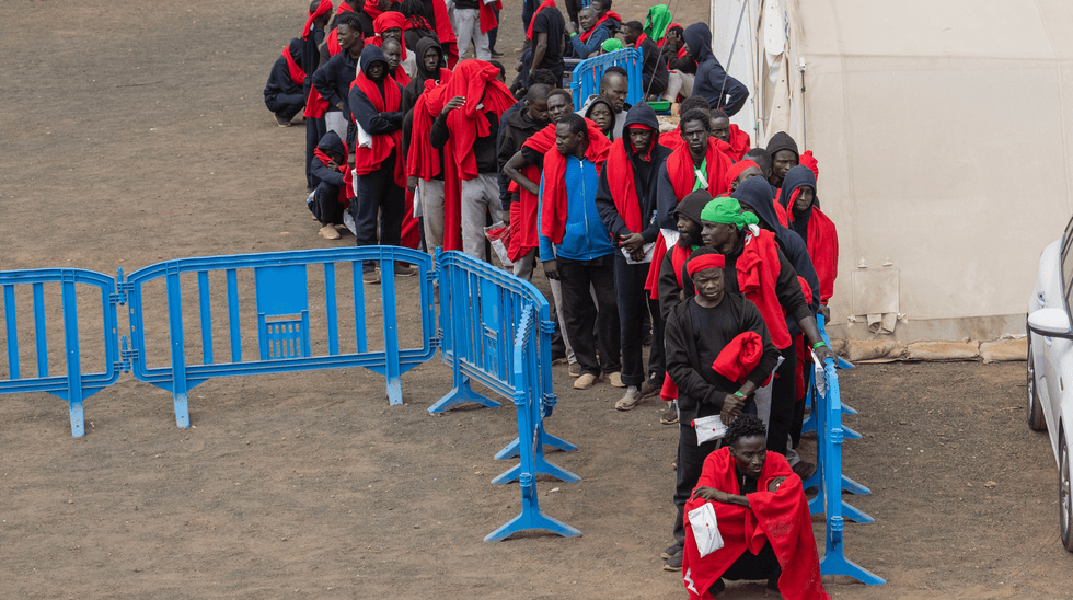 Several migrants wait to be transferred to the port of La Estaca, on 31 August, 2024 in El Hierro, Canary Islands, Spain
